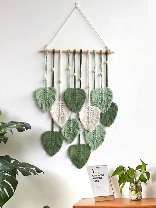 Elevate your home decor with the Bohemian Delight: Green Leaf Hanging Ornament. Featuring a charming design with green leaves, this ornament adds a touch of nature to any space. Made with high-quality materials, it not only looks beautiful but also lasts for years to come. Perfect for a stylish and eco-friendly touch to your home.