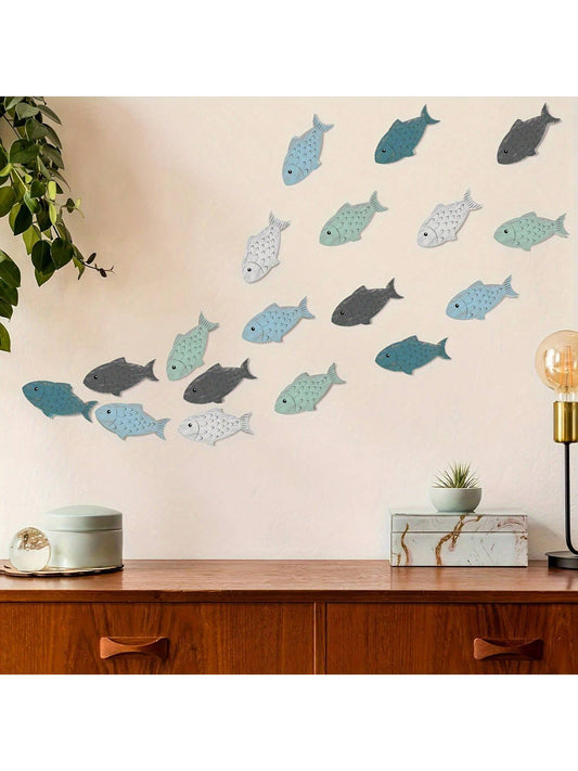 Add a touch of coastal charm to your home with our Wooden School of Fish Wall Decor. Made with quality wood, this piece features a school of fish design that will bring a sense of tranquility to any room. Perfect for beach lovers and ocean enthusiasts.