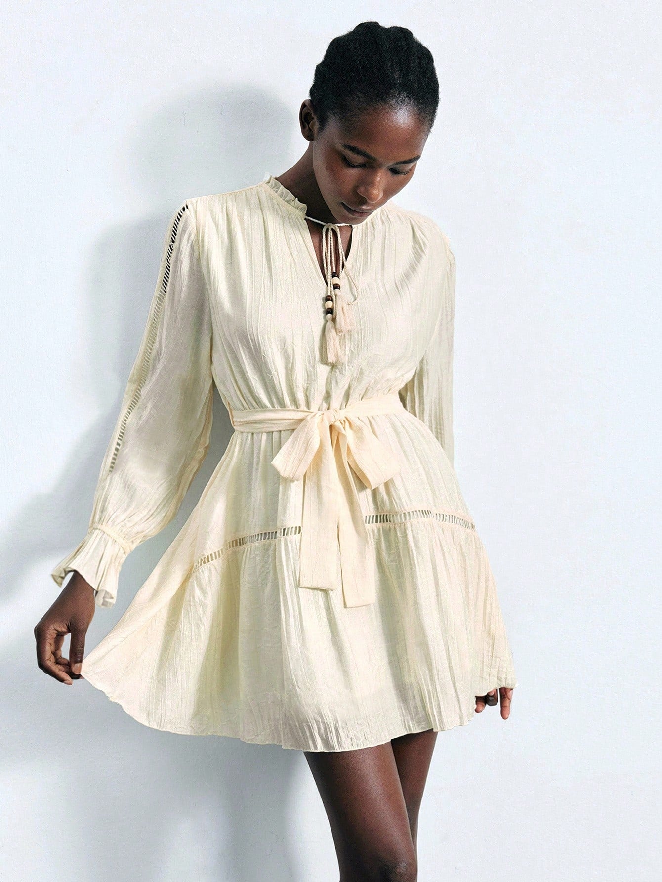 Chic Cream Ruffle Tie Mini Dress with Lantern Sleeves and Lace Patchwo – Canary Houze