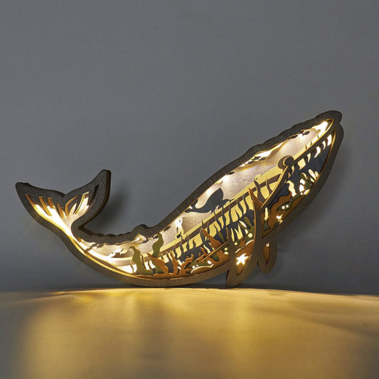 This Enchanting Blue Whale 3D Wooden Art Carving adds captivating visual flair to any home décor. Ideal for holiday gifts, this carving is unique and artistic. Turn on the night light and achieve a calming atmosphere with its warm glow. Enjoy a piece of art during the day and a peaceful night light in the evening.