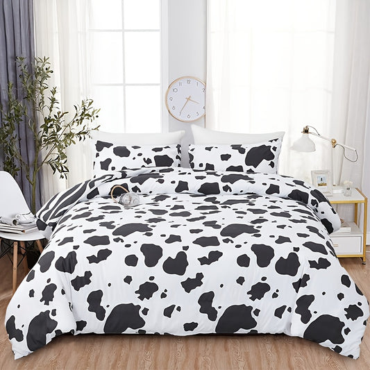 Sleep in style with this dual pattern Floral Printed Duvet Cover Set. One side features a beautiful cow print and the other is a vibrant zebra print. Set includes one duvet cover and two pillowcases, no core included. Transform your bedroom with this stylish and practical set.