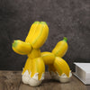 Add a touch of whimsy to your home decor with our Whimsical Banana Balloon Dog Ornament. This cute and playful decoration is sure to bring a smile to your face. Crafted with attention to detail, this ornament is perfect for anyone looking to add a unique and fun element to their living space.