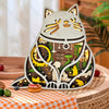 This intricately carved wood decoration features a whimsical fat cat design, perfect as a night light for indoor décor. The LED lights add a festive touch with Christmas & Halloween themes, making it a unique gift and desktop accent piece.