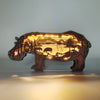 Bring a magical touch to your home with this unique 3D wooden art carving. This enchanting illuminated hippo is perfect for home décor or a memorable holiday gift. Its intricate details make it a one-of-a-kind piece of art. With its beautiful craftsmanship, this carving is sure to impress.