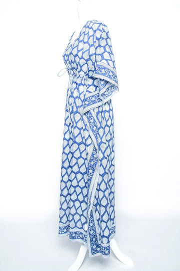 A blue patterned kaftan dress.