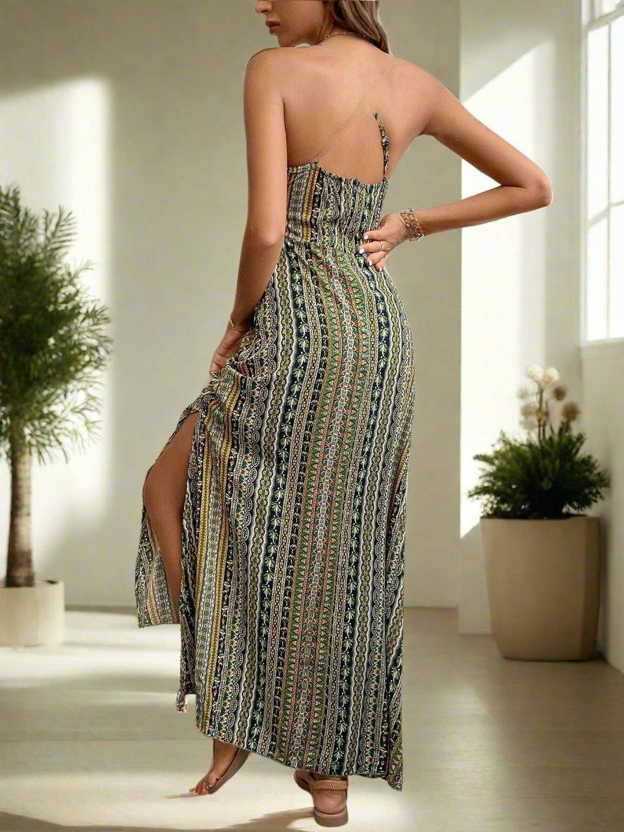 Elevate your vacation wardrobe with our Vacation Mode: Geo Print Split Thigh Cami Dress. Featuring a stylish geo print and sexy split thigh design, this dress is perfect for any warm weather destination. Stay cool and chic while making a statement on your next trip.