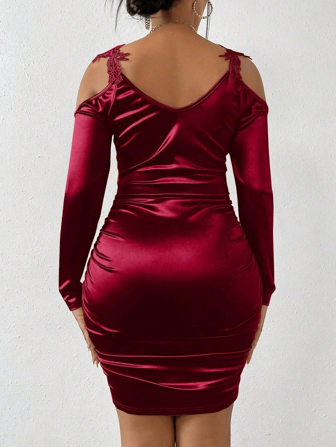 Introducing our Elegance in Satin: Lace Patchwork Open Shoulder Bodycon Dress, perfect for any special occasion. Made with luxurious satin and intricate lace patchwork, this dress is designed to showcase your natural curves while adding a touch of glamour. The open shoulder design adds an alluring touch, making you stand out in any event. Elevate your style and confidence with this timeless dress.