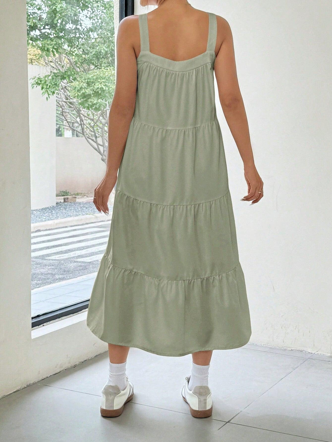 Effortlessly exude style and comfort this summer with our Sleeveless Babydoll A-Line Dress. Crafted with a flowing A-line silhouette, this dress will keep you cool and chic all day long. Perfect for any occasion, this dress is a must-have in your summer wardrobe.