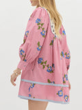 Embrace effortless bohemian style with this charming floral mini dress. Featuring a flattering V-neckline, romantic puff sleeves, and an A-line silhouette, this versatile piece transitions seamlessly from garden gatherings to casual street wear. The loose fit and medium stretch fabric ensure all-day comfort, while the delicate floral print adds a touch of whimsy. Perfect for spring and summer adventures, this dress pairs beautifully with sandals or sneakers for an understated, chic look that celebrates your