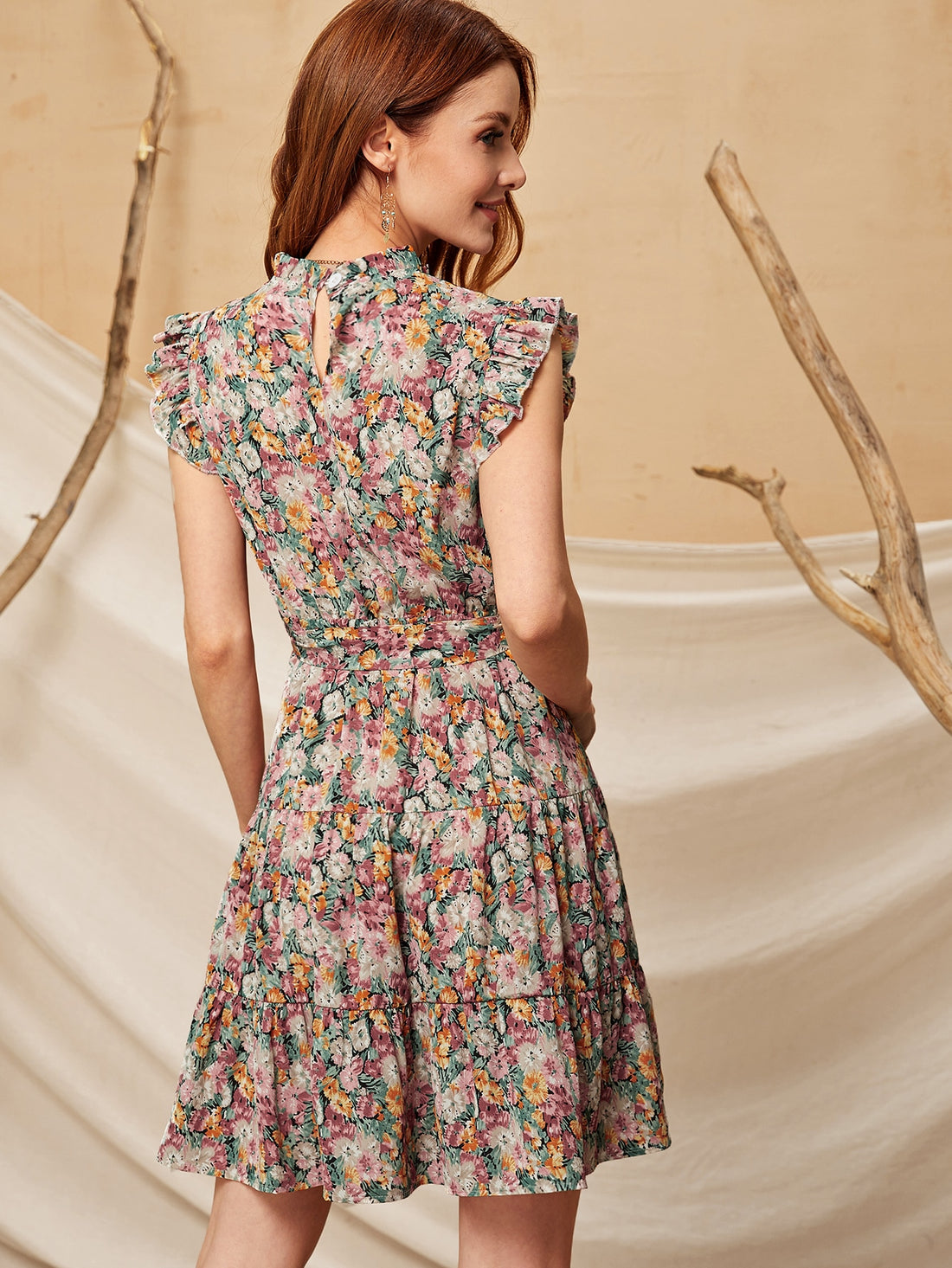 Effortlessly exude elegance with our Chic Floral Ruffle Hem Belted Dress. Perfect for any occasion, this dress adds a touch of playfulness with its ruffle hem and belt, while still maintaining a sophisticated look. Embrace your inner flower child and stand out in this quirky, yet charming dress!