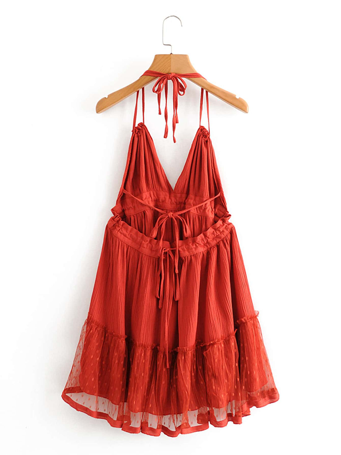 Unleash your fashion game with the playful Rosie layered halter dress! Elevate your style with this open-back piece, perfect for a night out with friends or a special date. Confidence and style will be effortlessly achieved with this unique and daring piece.