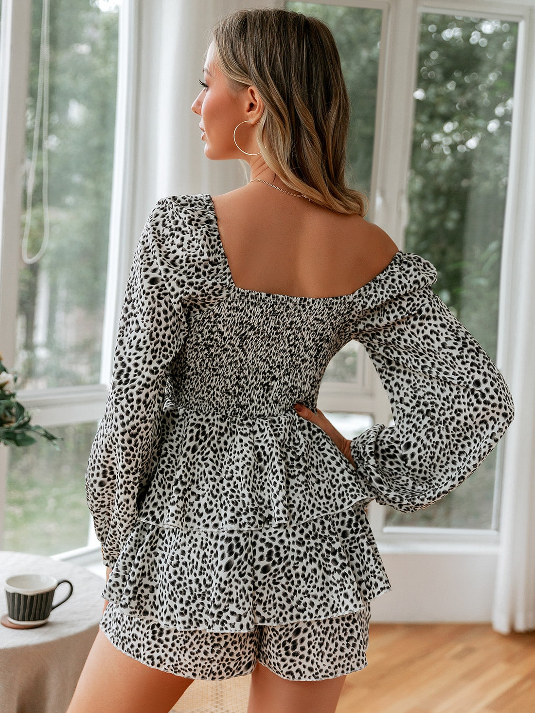 This stunning Leopard Romper features stylish Lantern Sleeves and a sophisticated Layered Trim, creating a chic and trendy look. Made with high quality materials, this romper offers comfort and durability while making a fashion statement. Perfect for any occasion, stand out with confidence in this one-of-a-kind piece.