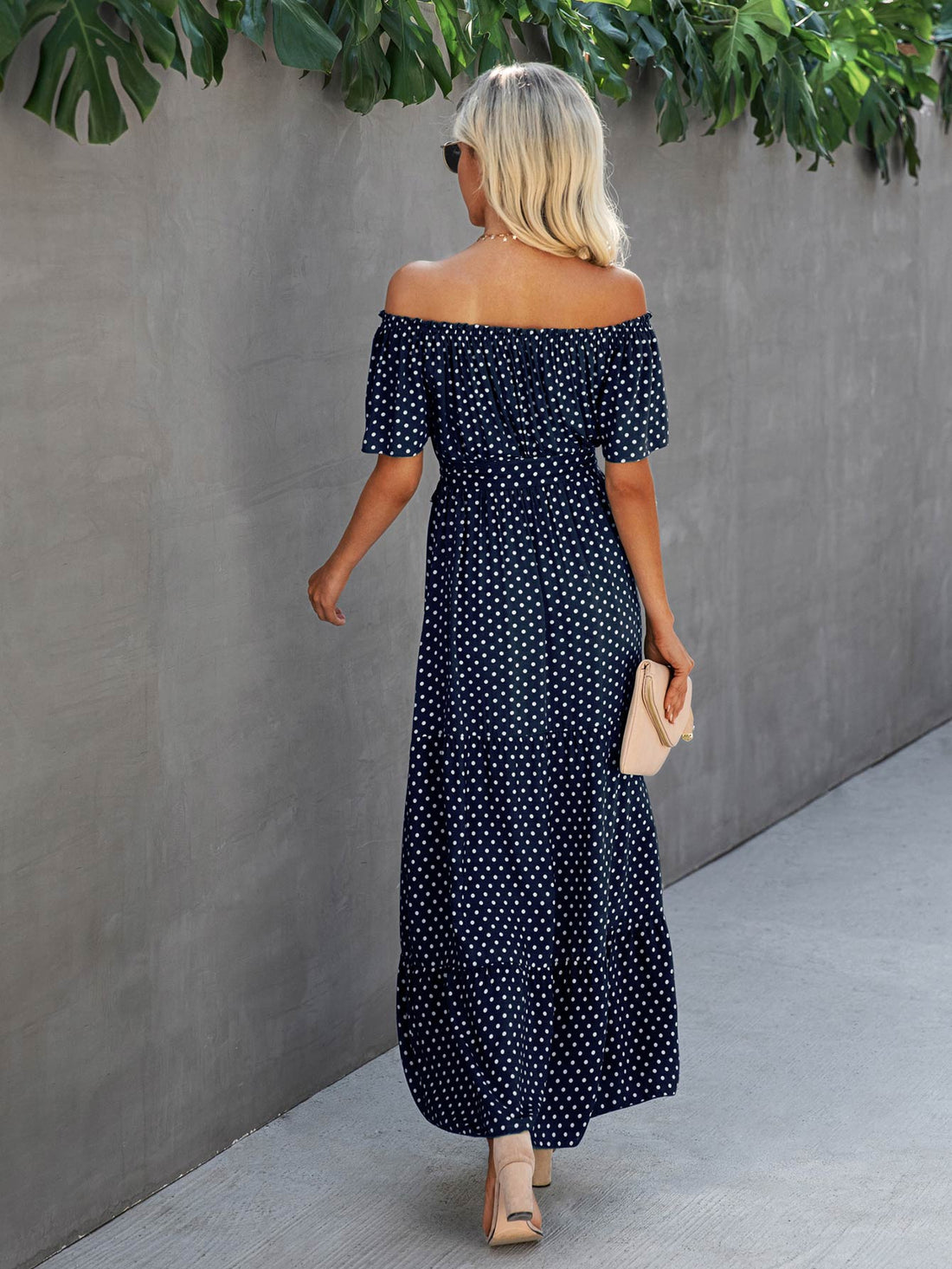 Look effortlessly elegant in this Chic Polka Dot Off-the-Shoulder Belted Dress. The off-the-shoulder design and polka dot print add a touch of chicness, while the belted waistline accentuates your figure. Perfect for any occasion, this dress exudes sophistication and style.