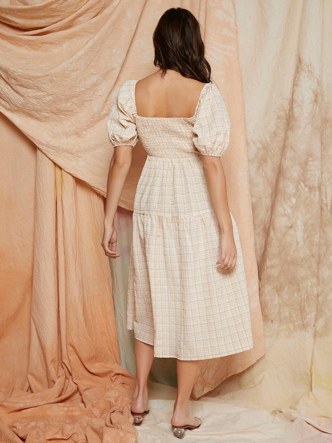 Effortlessly style any occasion with our Chic Gingham Puff Sleeve Dress! This dress features a charming gingham print and playful puff sleeves. Perfect for those looking for a fun and quirky statement piece in their wardrobe. Say goodbye to boring dresses and hello to effortless style!