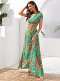 Back view of tropical crop top with adjustable tie and flowing wrap skirt
