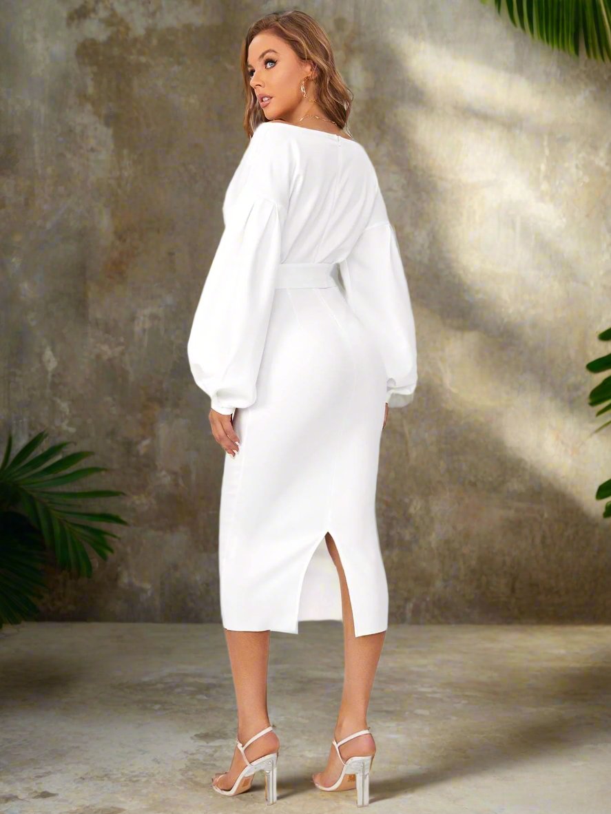 Elevate your style with our Chic and Sophisticated dress. Featuring a surplice neckline and drop shoulder design, this dress exudes both elegance and confidence. The belted waist accentuates your figure, making you feel chic and sophisticated. Elevate your wardrobe and stand out from the crowd with this must-have dress.