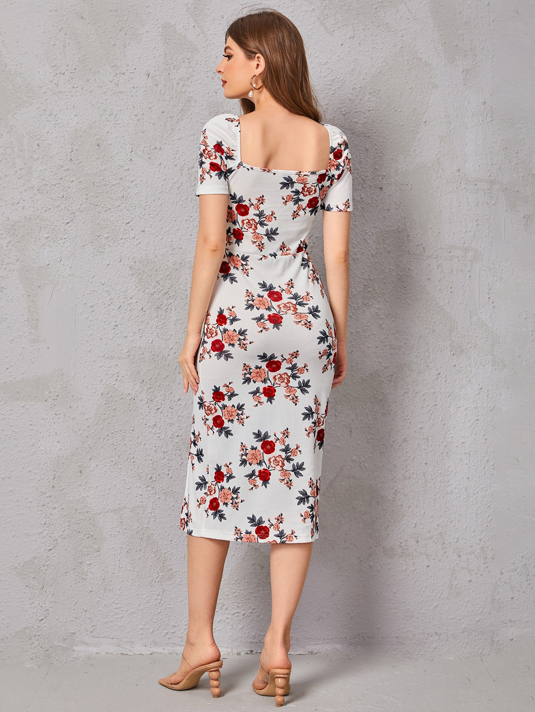 Elevate your summer style with this elegant and playful floral print dress. Featuring a split thigh design, it's the perfect statement piece for any occasion. Stay cool and comfortable while making a fashion statement that's both bold and beautiful.