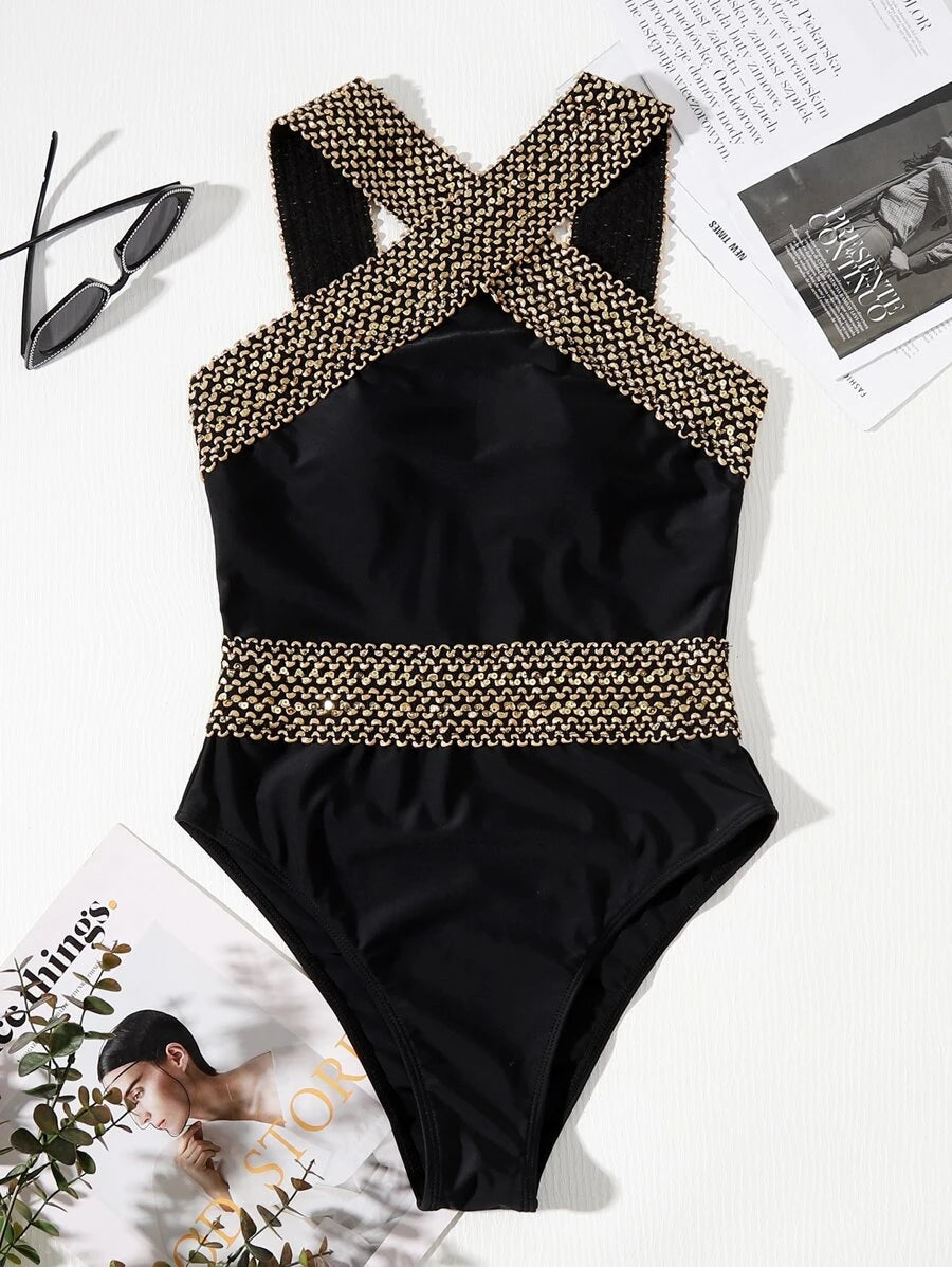 Make a splash this summer in our criss-cross one-piece swimsuit, designed for comfort and style. The flattering criss-cross front detail creates a chic silhouette while the contrast binding adds a modern pop of color. Crafted from quality fabric with excellent stretch and recovery, this swimsuit moves with you whether you're lounging poolside or diving into the waves. The supportive fit and classic cut make it a versatile choice for any beach day. Perfect for swimming, sunbathing, or resort wear.