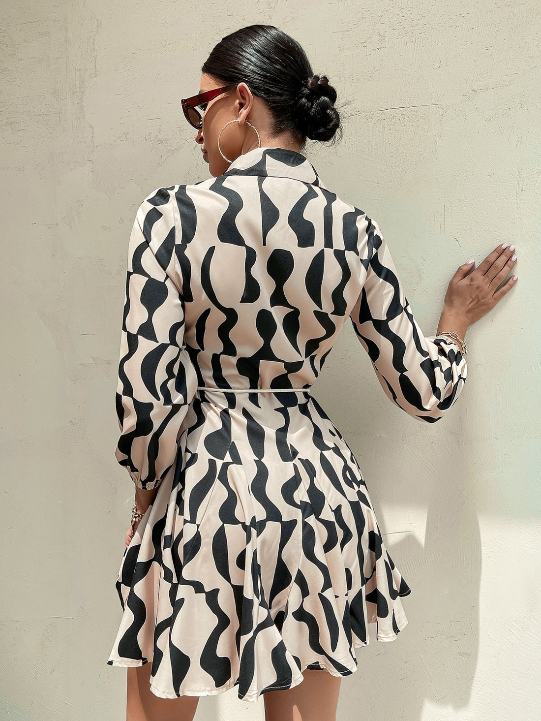 Step out in style with the Chic Clasi Allover Print Lantern Sleeve Belted Shirt Dress! Featuring playful lantern sleeves and a flattering belt, this dress adds a fun twist to your everyday wardrobe. Its allover print brings a lively vibe, making it perfect for turning heads wherever you go. Comfortable and chic, it’s your new go-to for effortless, stylish days.