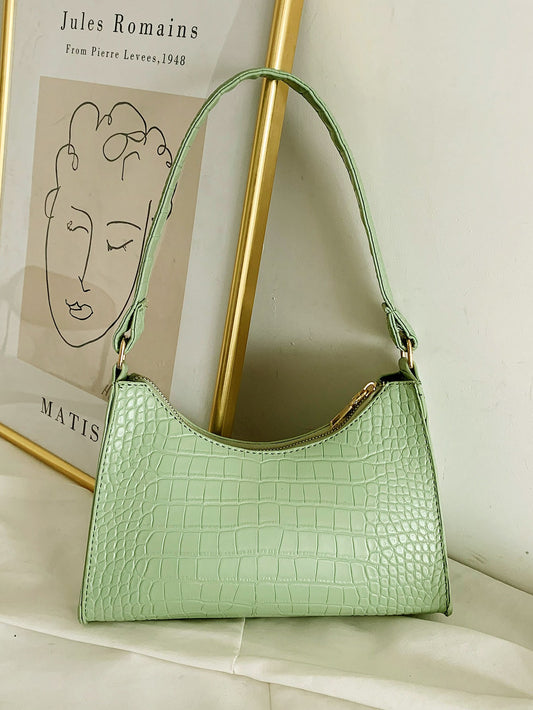 As an industry expert, you'll appreciate the Crocodile Chic: Embossed <a href="https://canaryhouze.com/collections/canvas-tote-bags?sort_by=created-descending" target="_blank" rel="noopener">Bag</a> for Every Occasion. With its unique embossed texture, this bag adds a touch of sophistication to any outfit. Its versatility makes it perfect for any occasion, from a day at the office to a night out on the town.
