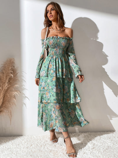 This elegant Off-The-Shoulder dress, adorned with a vibrant floral print, adds a touch of sophistication to any outfit. Made with high-quality fabric, it offers comfort and style in equal measure. Perfect for any occasion, this dress is a must-have for your wardrobe.