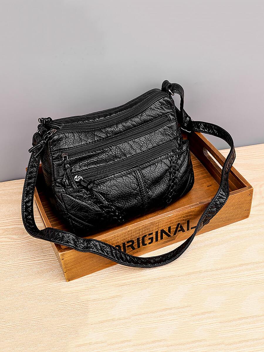 Add a dash of vintage charm to your everyday look with this Chic Vintage PU Leather Shoulder Bag. Perfectly sized for all your essentials, it switches effortlessly between messenger and crossbody styles to match your mood. Soft yet durable PU leather ensures comfort and long-lasting wear, making it your new go-to companion for city strolls or weekend adventures. Carry a little nostalgia with a modern twist!