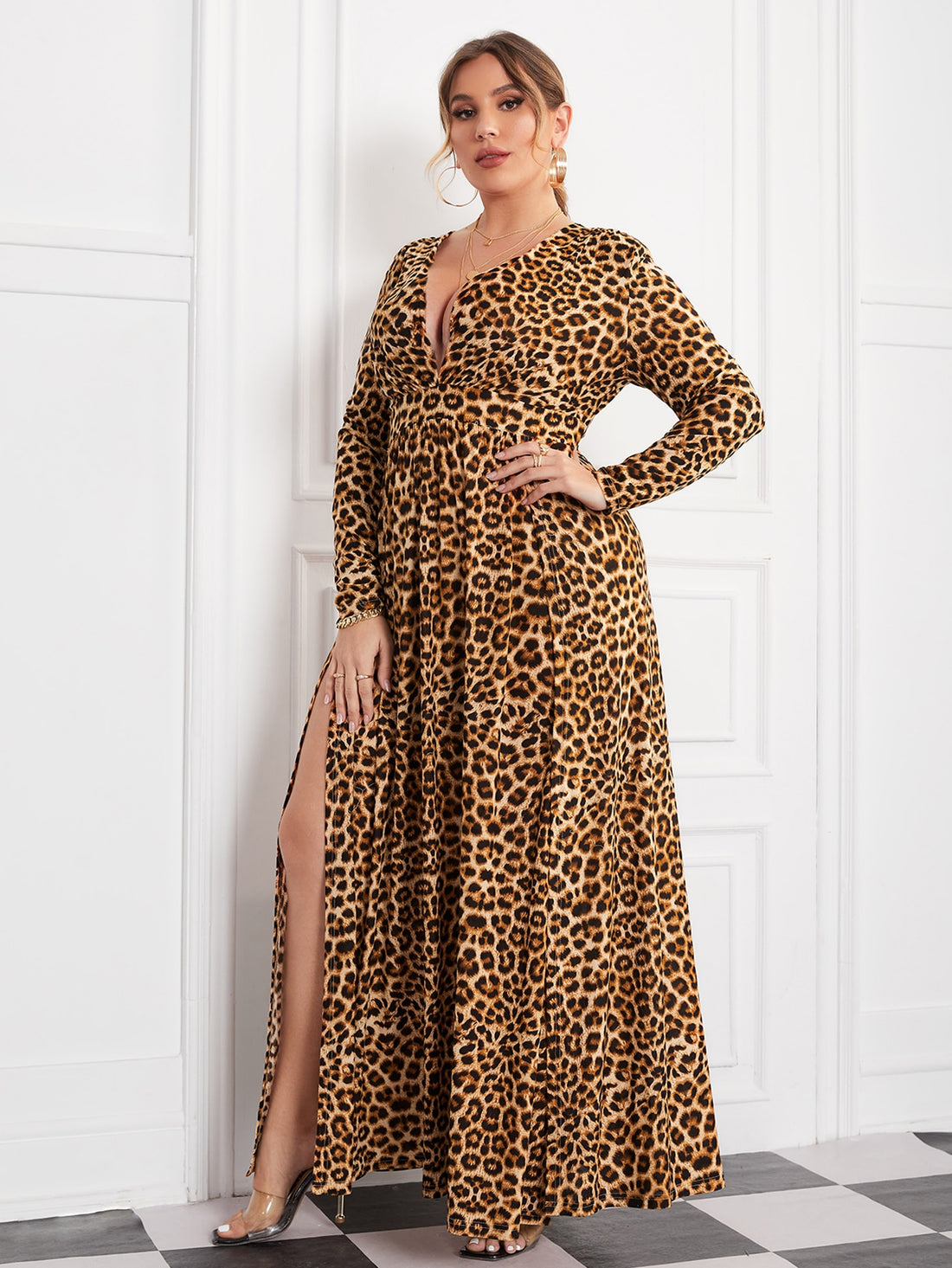 Unleash your fierce and confident style with our Chic Plus-Size Leopard Print Dress! With a plunging neckline and split thigh design, this dress will have heads turning. Dress it up for a night out or down for a day at the office. Embrace your inner wild side and make a statement with this bold and stylish dress!