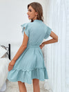 Polka Dot Perfection: Elegant Summer Dress with Ruffled Hem and Waist Belt