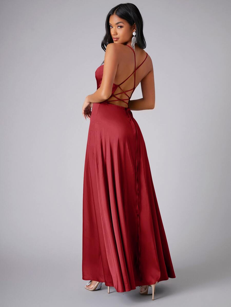 Back view of burgundy gown with crisscross straps and open back