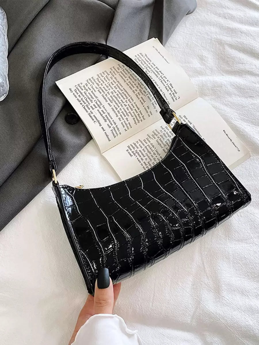 Step out in style with this Trendy Zebra Print Shoulder Bag, crafted from high-quality PU leather that’s both durable and chic. The bold zebra and subtle leopard accents add a fun twist to your everyday look, while the perfect underarm size keeps your essentials close and hands-free. Whether for brunch or a night out, this playful purse is your new favorite companion for effortless style and convenience.