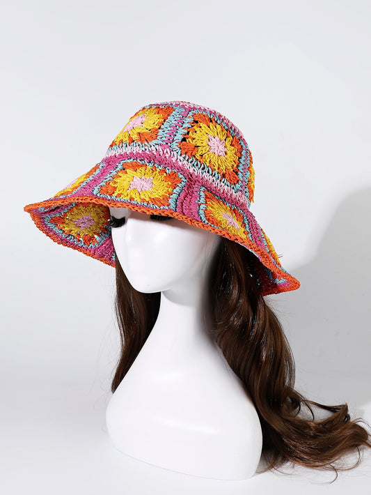 Stay stylish and protected this summer with our Boho Chic Color Block Straw Hat. Made with trendy color blocking for a bohemian touch, this bucket hat is the ultimate accessory. Shield yourself from the sun while staying fashion-forward.