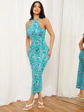 Angled front view of turquoise boho floral halter dress