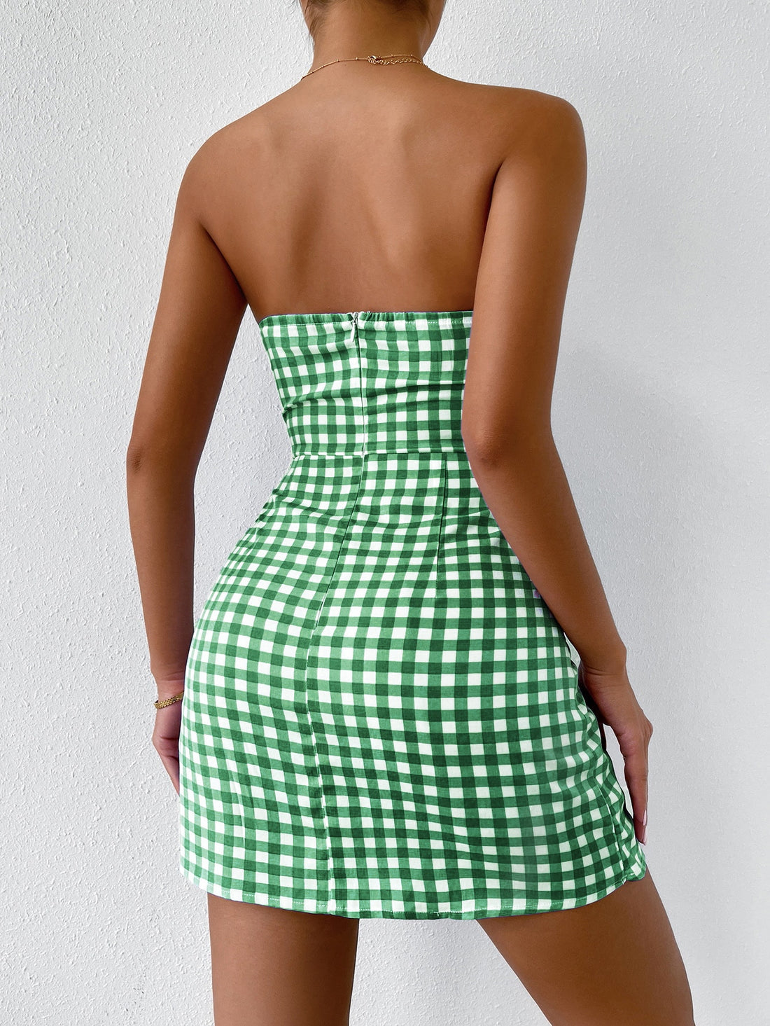 Stay warm and stylish with our Chic and Cozy Plaid dress. Featuring a flattering wrap design, frill trim, and a trendy knot detail, this dress will elevate your fashion game. Made with soft and comfortable material, you'll love the way you look and feel in this versatile dress.