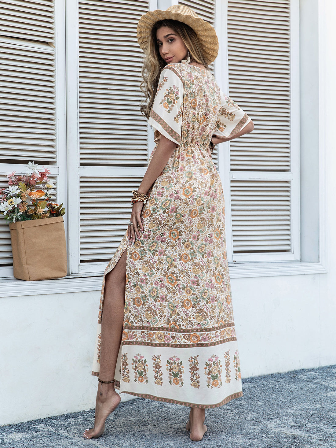 Elevate your bohemian style with our Boho Chic Floral Print Dress. The trumpet sleeves and tassel drawstring waist add a unique touch to this dress. Made with a delicate floral print, this dress is perfect for any occasion. Embrace the boho vibe while feeling stylish and comfortable.