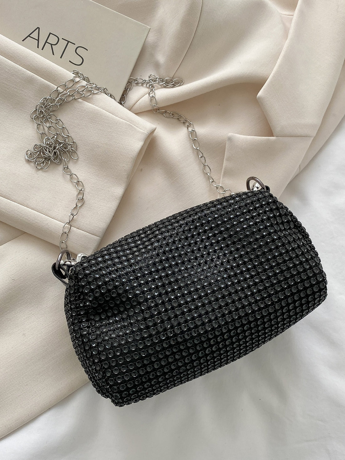 Experience the ultimate in glamour and sophistication with the Sparkle and Shine Bucket Bag! Perfect for any glamorous evening, this bag combines style and functionality with its shimmering design and spacious interior. Don't be without the party essential that will surely turn heads.
