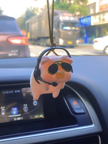 Add a touch of cuteness to your car with the Piggy on the Go ornament. This adorable cartoon pig is the perfect companion for your daily commute. Made from high-quality materials, it's durable and easy to hang. Bring joy and charm to your car with this charming addition.