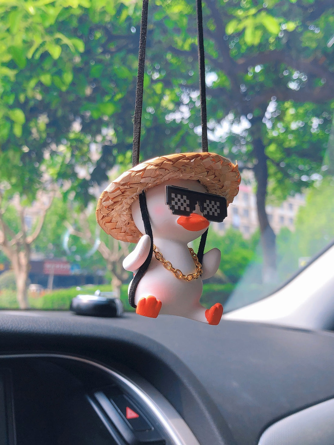 Add a whimsical touch to your vehicle with our Duck Design Car Hanging Ornament. Made for Duck enthusiasts, this Quack-tastic addition is sure to bring a smile to your face while on the road. Made with high-quality materials, this ornament will last for many adventures to come.