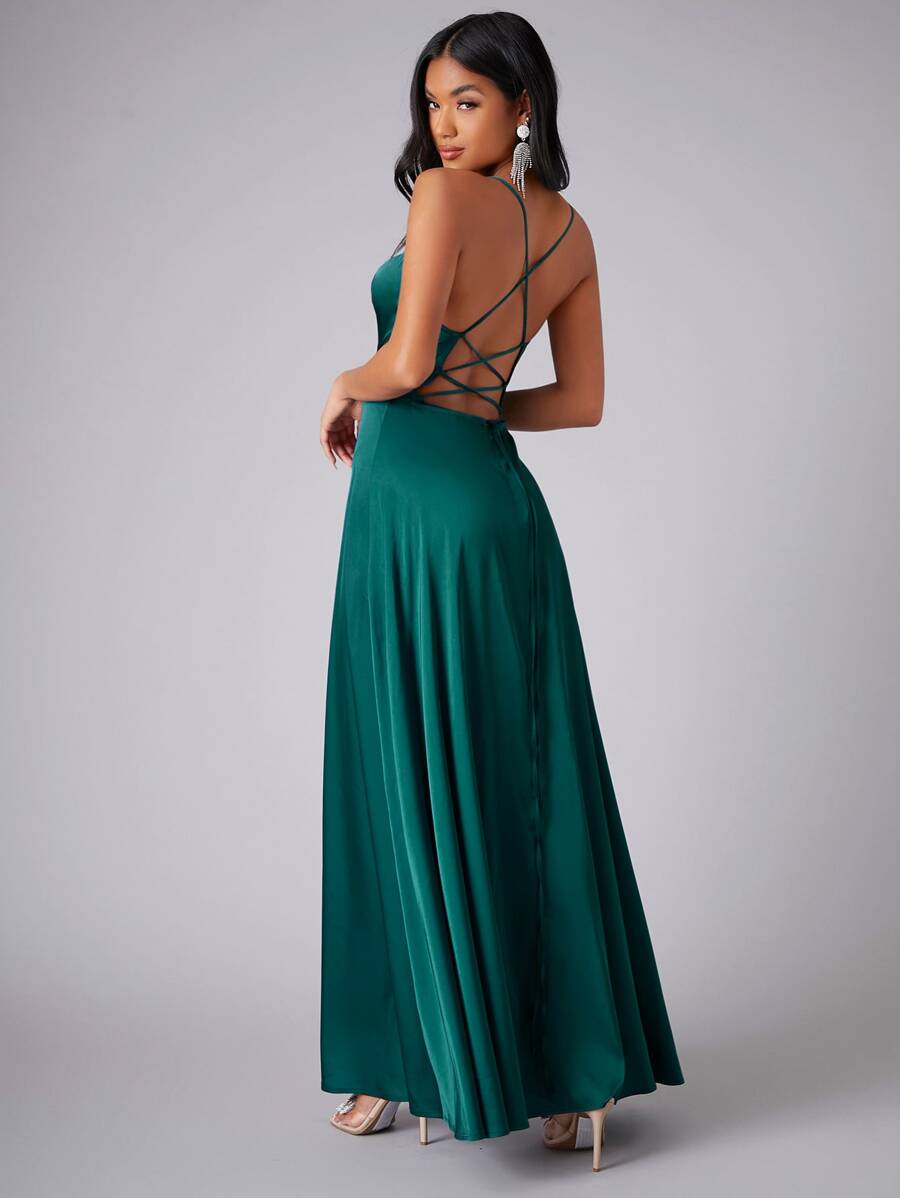 Back view of teal gown showing crisscross straps and open back