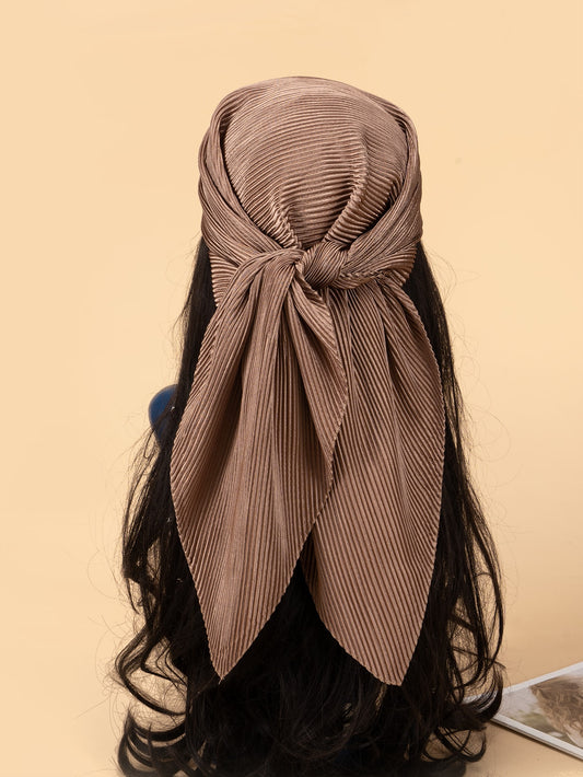 This versatile Chic Pleated Scarf is the ultimate must-have accessory for your daily life, outdoor adventures, and traveling. Elevate any outfit with its chic design, while staying warm and comfortable. Made with high-quality materials, it's perfect for any occasion. Stay stylish with this essential piece.