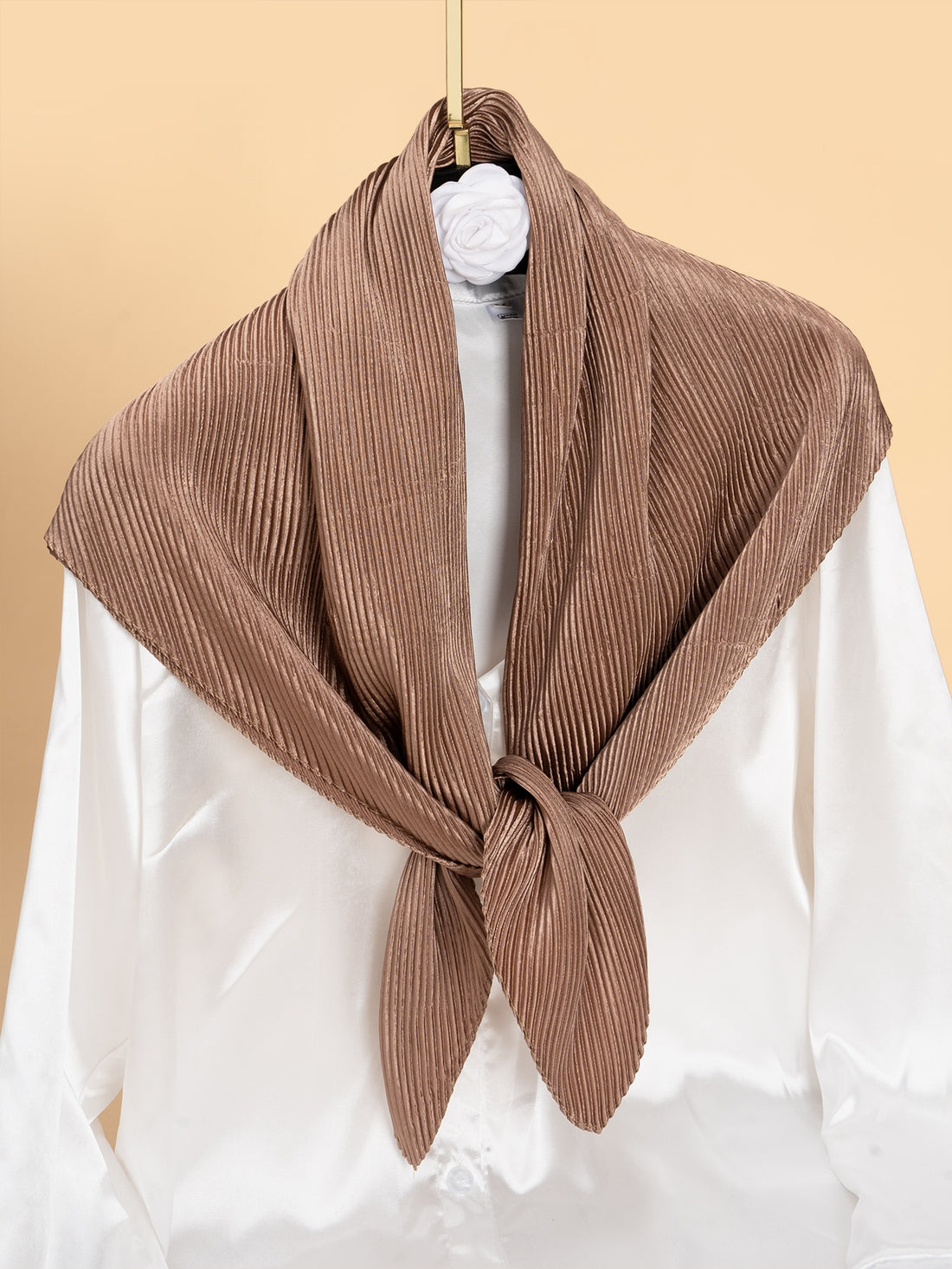 This versatile Chic Pleated Scarf is the ultimate must-have accessory for your daily life, outdoor adventures, and traveling. Elevate any outfit with its chic design, while staying warm and comfortable. Made with high-quality materials, it's perfect for any occasion. Stay stylish with this essential piece.