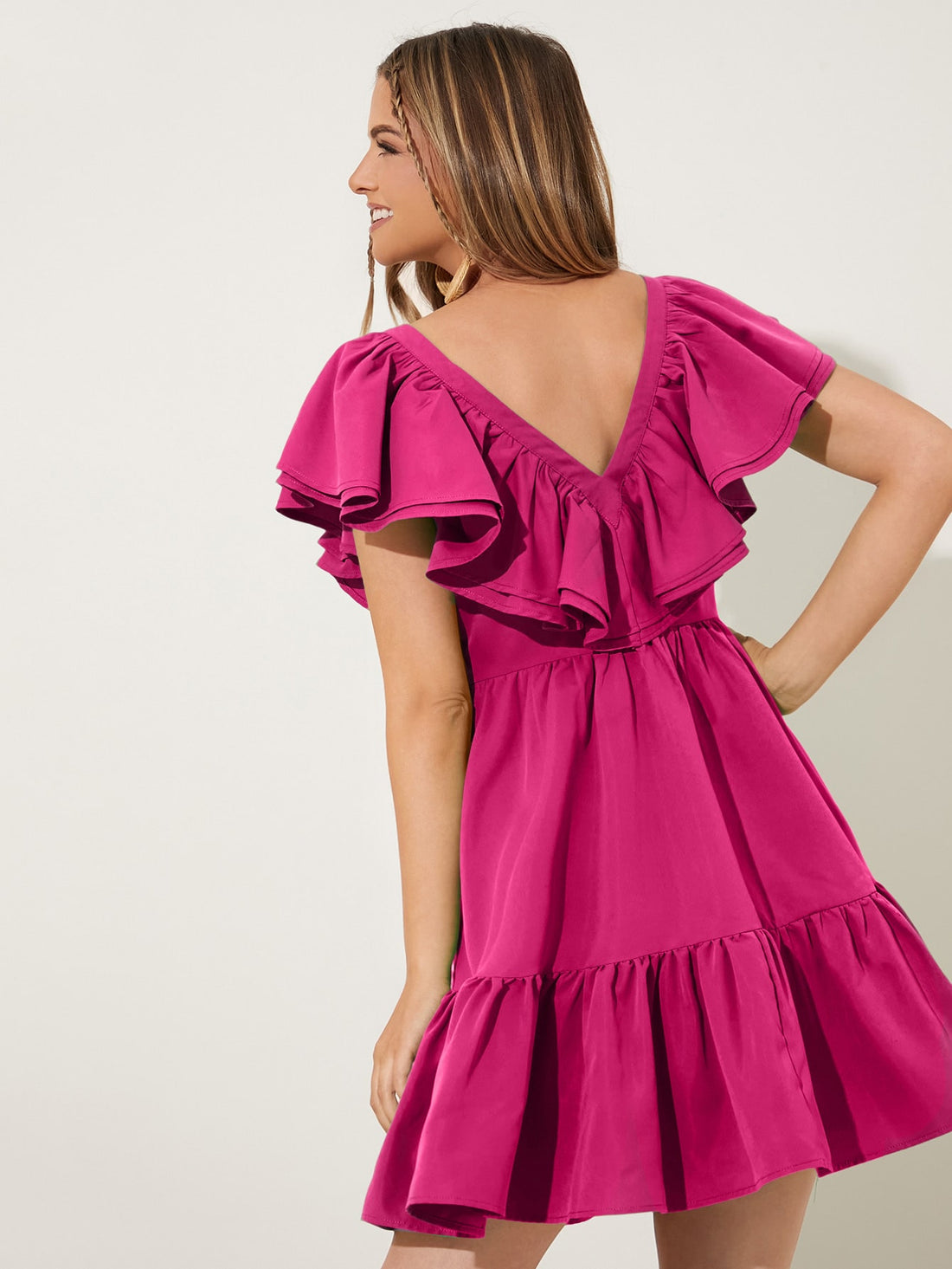 This chic two-layered ruffle hem dress is the ultimate style statement for any fashion-forward individual. With its intricate ruffle detailing and elegant design, this dress is sure to make a lasting impression. Perfect for any occasion, this dress combines style and sophistication seamlessly. Elevate your wardrobe with this must-have piece.