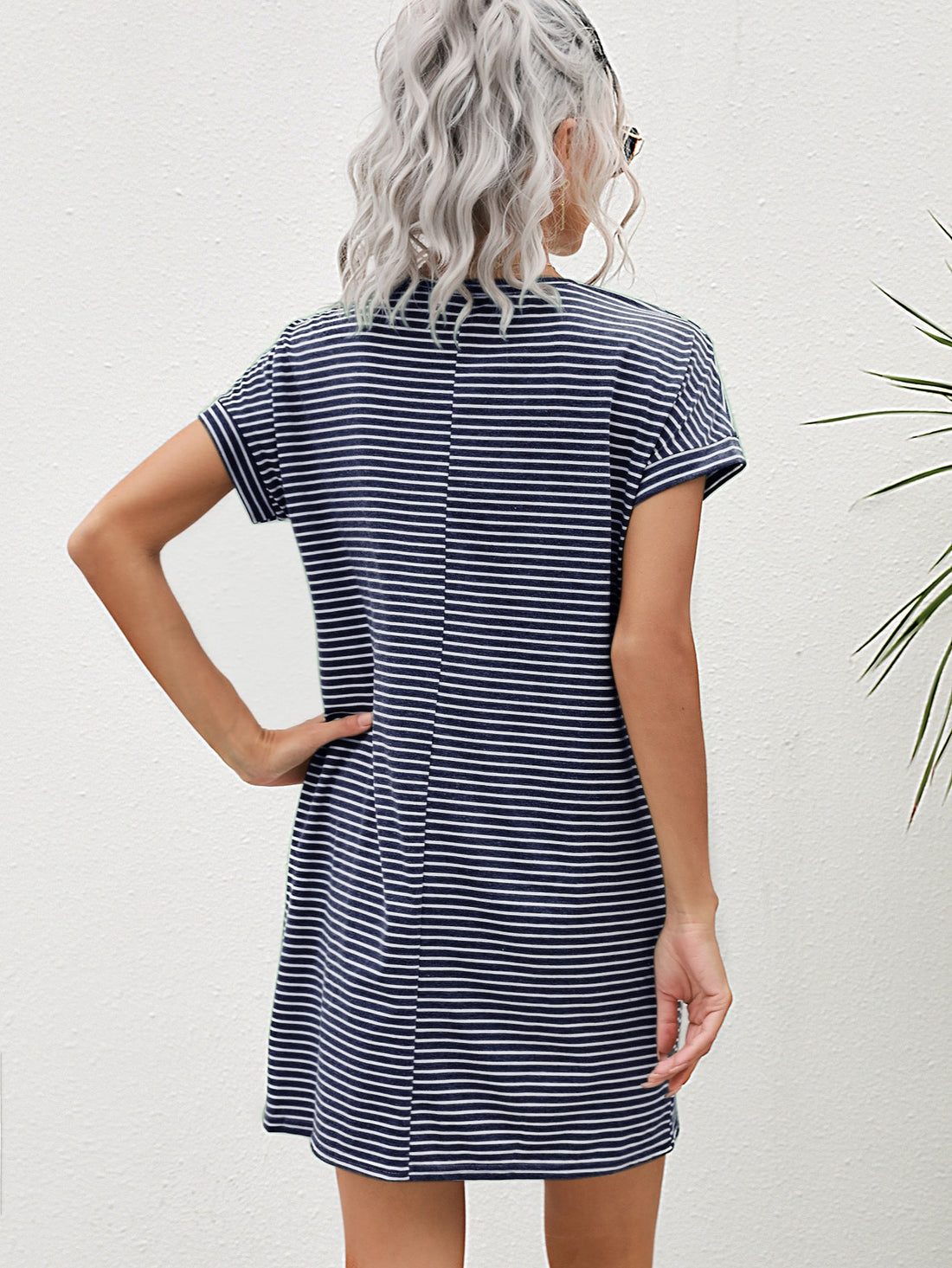 Effortlessly stylish and versatile, this Chic Striped Pocket Tee Dress is perfect for any occasion. With its chic striped design and pocket details, you'll stand out in style while staying comfortable. Perfect for dressing up or down, this dress is a must-have for every wardrobe.