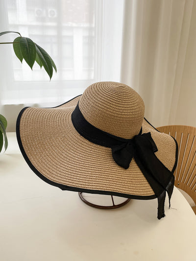 Sun-Kissed Elegance: Milk White Wide Brim Sun Hat with Bowknot Decoration