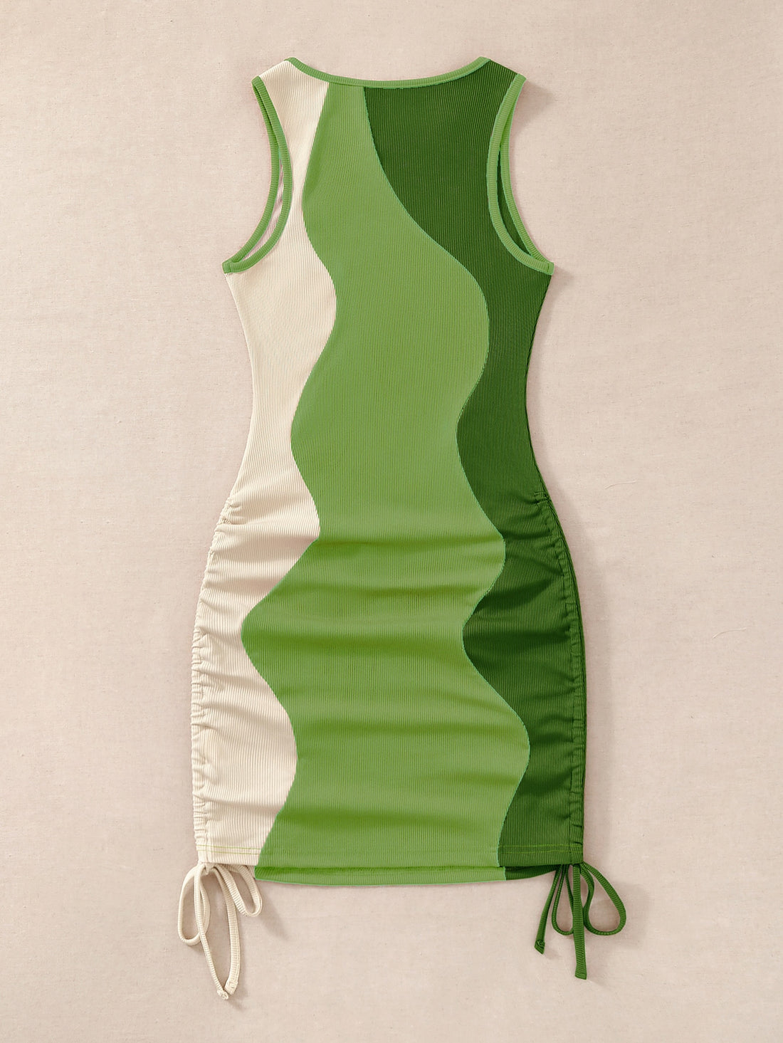 Stay stylish and comfortable in our Chic and Comfy tank dress. With a drawstring side and color block design, this bodycon dress flatters your figure while providing a customizable fit. Perfect for any occasion, this dress is a must-have for your wardrobe.