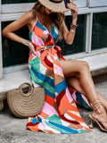 Seated view of multicolor belted wrap maxi dress styled for a beach getaway