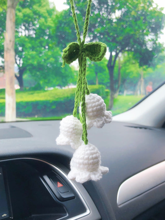 Add a touch of vintage charm to your car with our Knitted Floral Rearview Mirror Hanging Ornament. Made from high-quality materials, this beautifully crafted ornament adds a unique and stylish touch to your car's interior. Enjoy the beauty and elegance of a bygone era with this one-of-a-kind accessory.