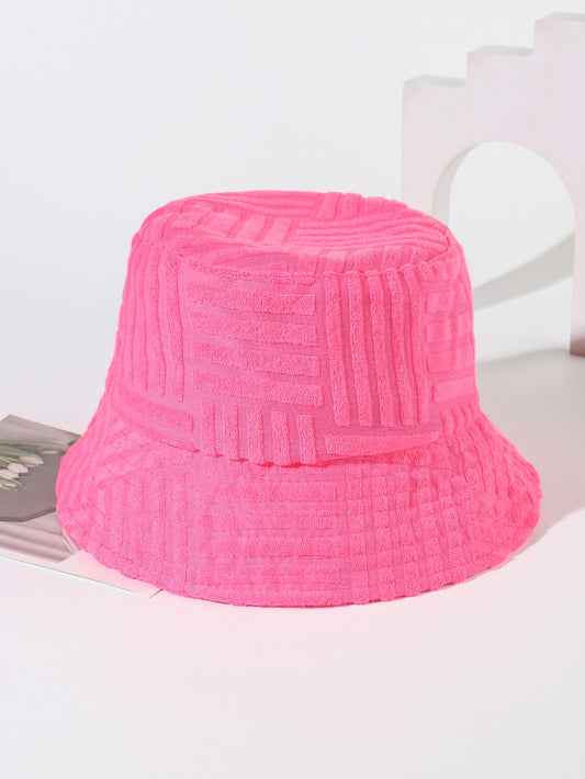 Elevate your casual style with our Pretty in Pink embroidered bucket hat. Made with a chic design and delicate embroidery, this hat is perfect for adding a touch of elegance to any outfit. Stay cool and fashionable while protecting yourself from the sun. Available in one size to fit all.