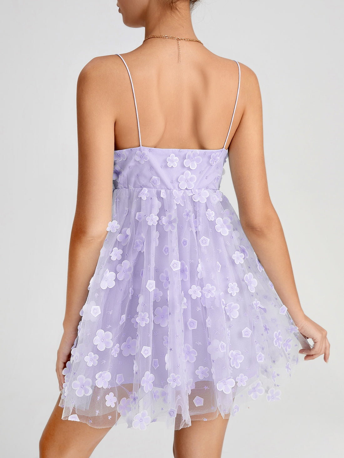 Turn heads in this stunning backless mesh cami dress, where elegance meets edge. The delicate Belle applique detail adds a touch of whimsy and sophistication, while the daring open back design keeps things flirty and fun. Perfect for date nights, parties, or whenever you want to feel absolutely fabulous. The lightweight mesh fabric moves with you, creating an effortlessly chic silhouette that's sure to make a statement. Dress it up with heels or keep it casual—this versatile piece is your new go-to for look