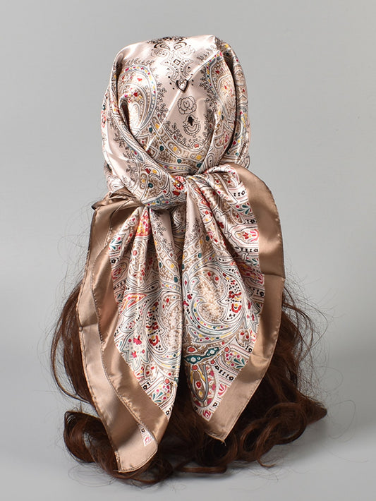 This Stylish Scroll Print Scarf is the perfect gift for all ages. Made with high-quality materials and featuring a unique scroll pattern, it adds a touch of elegance to any outfit. Its versatile design makes it suitable for any occasion, making it a must-have accessory for all ages.