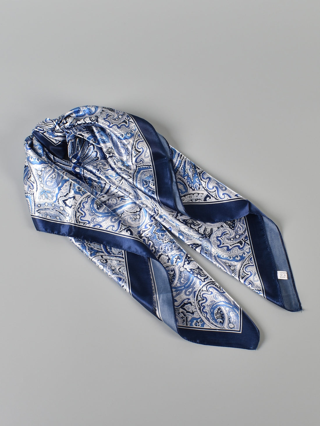 Effortlessly elevate your look with our stylish paisley pattern bandana. This women's head scarf features a classic design that adds a touch of sophistication to any outfit. Made with quality materials, it's perfect for adding a pop of color and completing your ensemble with a fashionable touch.